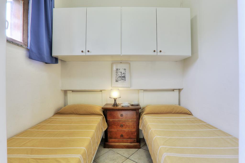 Residence Vacanza Mare Marina di Campo Værelse billede