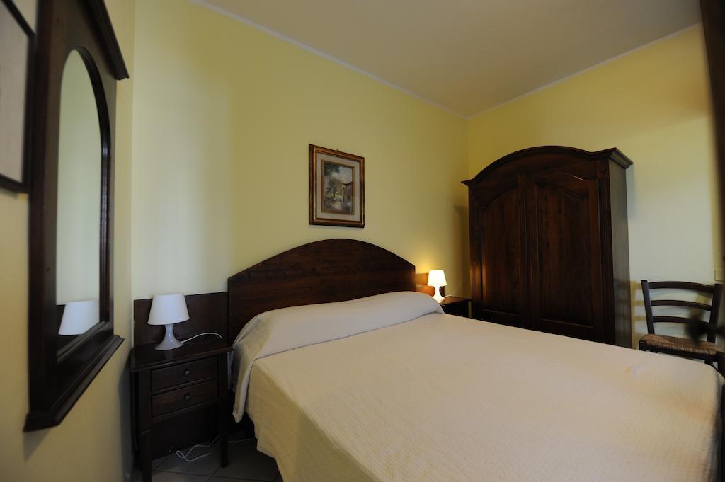 Residence Vacanza Mare Marina di Campo Værelse billede