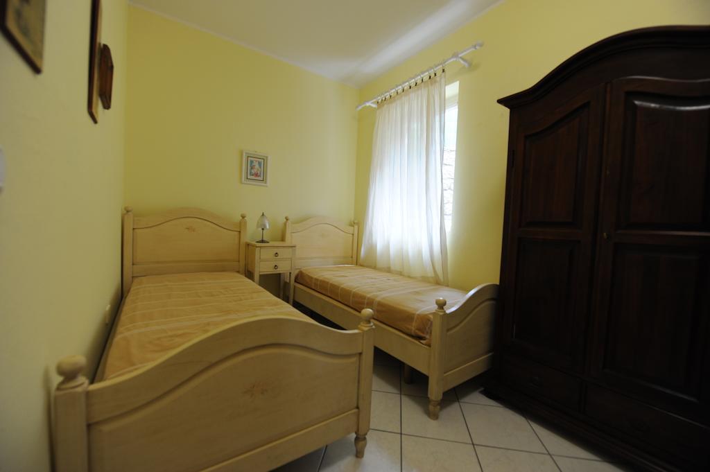 Residence Vacanza Mare Marina di Campo Værelse billede